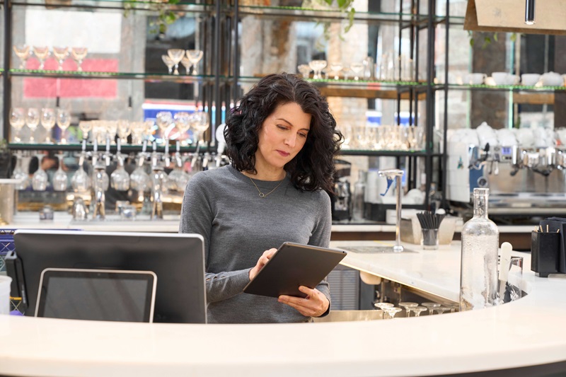Woman running a bar